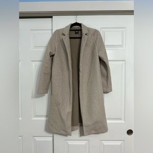 Zara trench coat. Beige color not heavy but nice throw over coat for the fall.